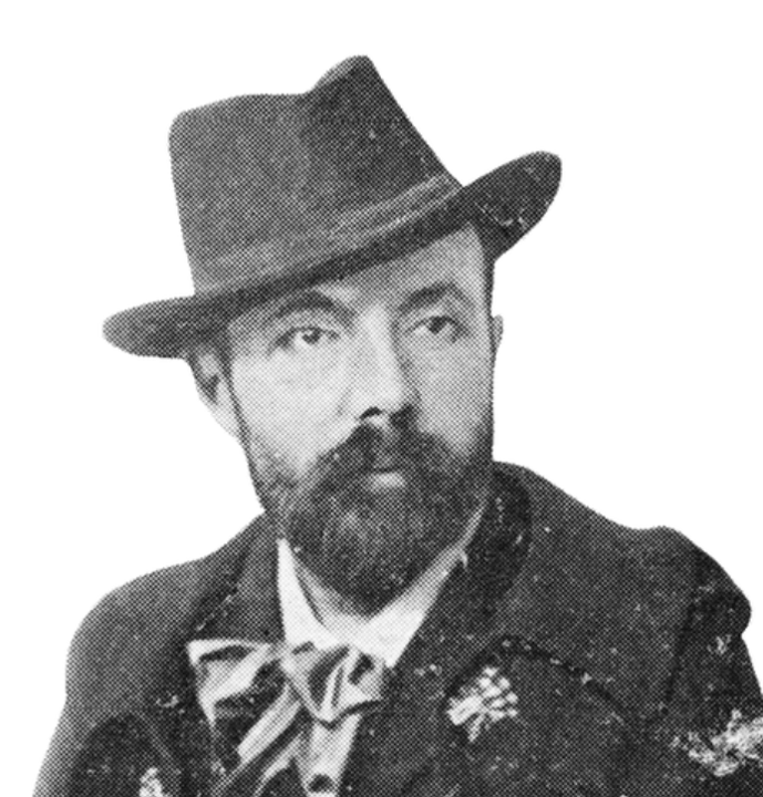 Portrait en noir et blanc d’Henri Bouvet portant un chapeau